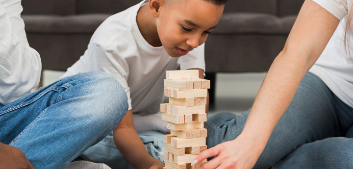 Child Playing Jenga